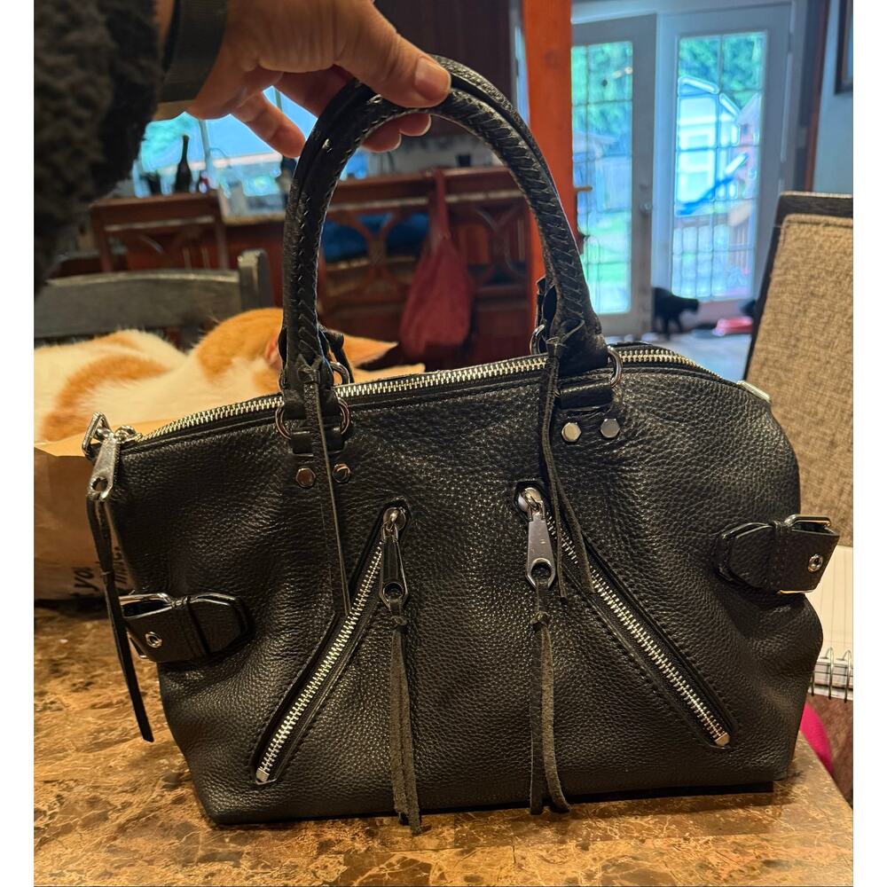 Rebecca Minkoff's top-handle crossbody is small but street-savvy. - Picture 2 of 5